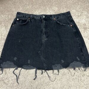 Topshop distressed black denim skirt